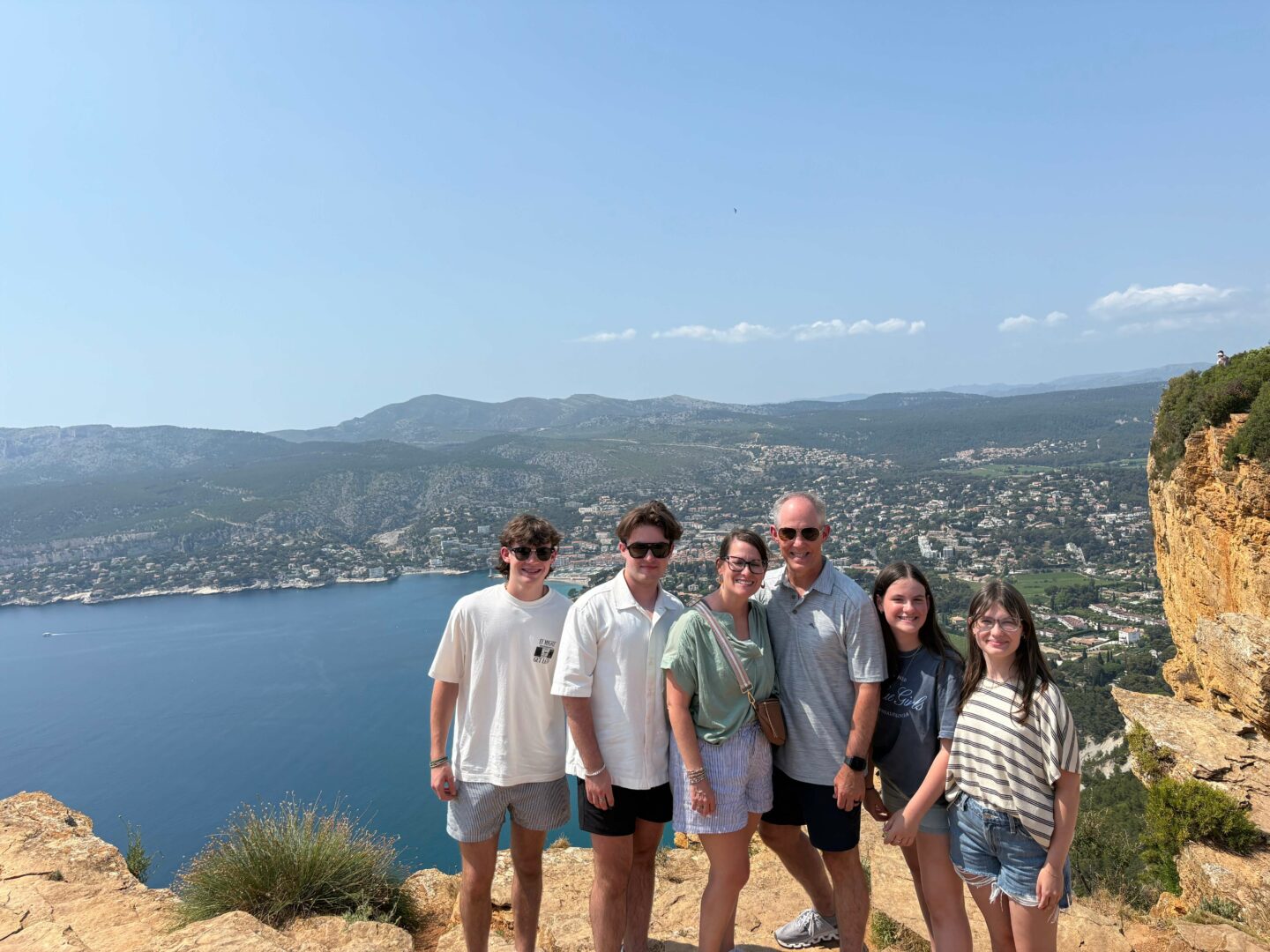 Family exploring Cassis, old town of Provence together