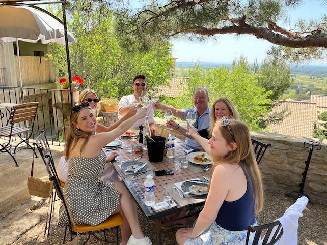 Guests enjoying authentic local wine and food in a family-run vineyard in Provence